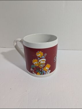 The Simpsons Christmas Mug 2010